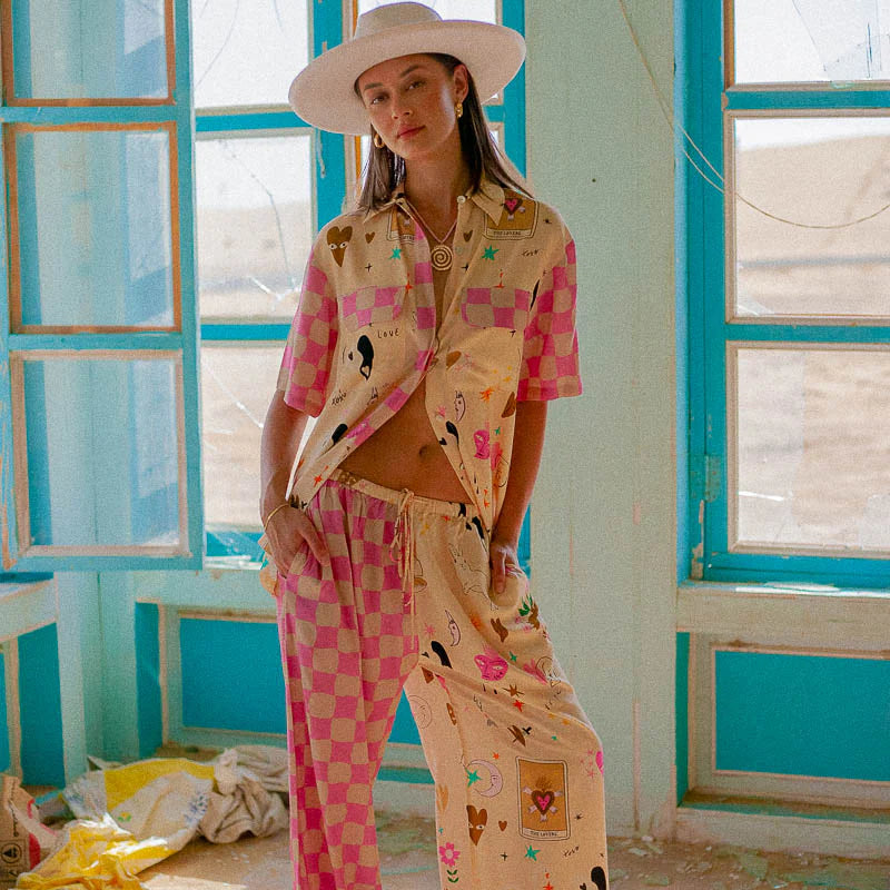 Womens pants - The Lovers Pants by Palm Collective with pink check pattern down one leg