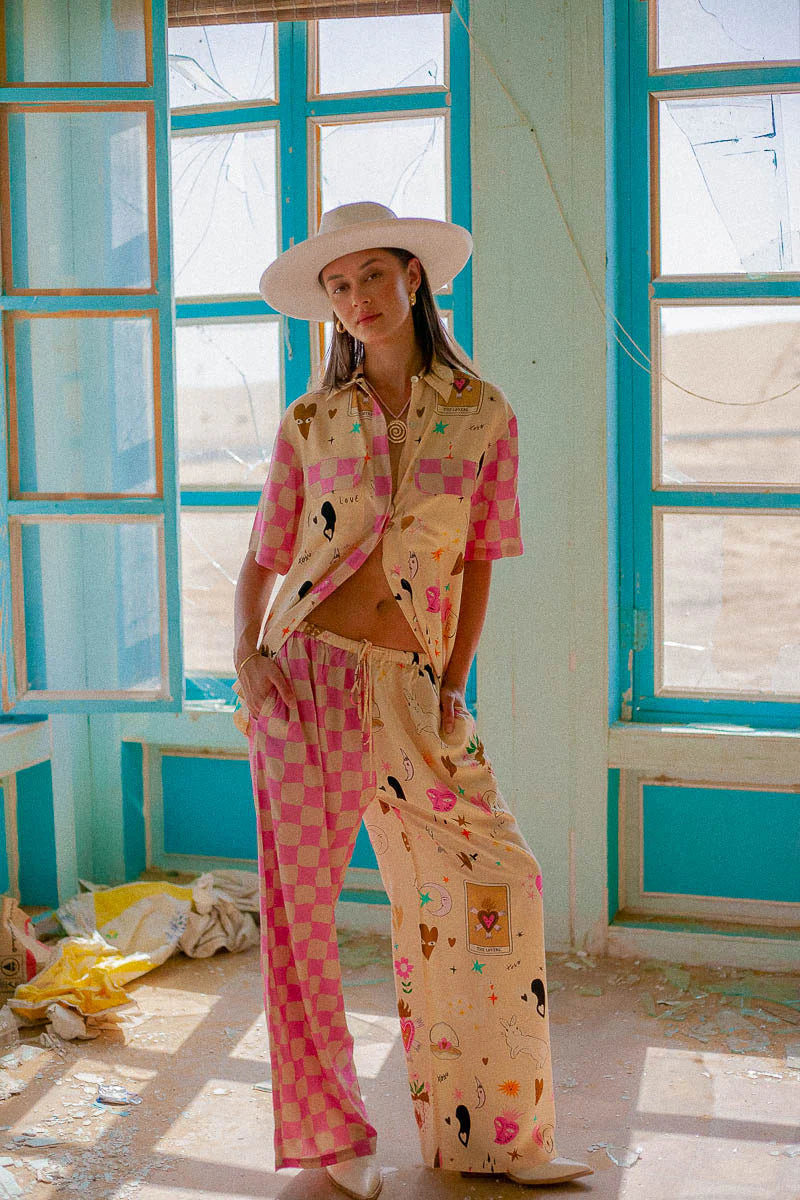 Womens pants - The Lovers Pants by Palm Collective with pink check pattern down one leg