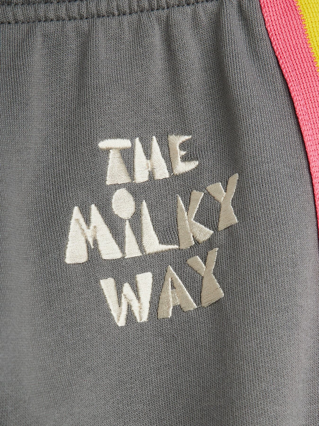 embroidery detail on The Milky Way Rainbow Panel Sweatpants – Grey by Mini Rodini