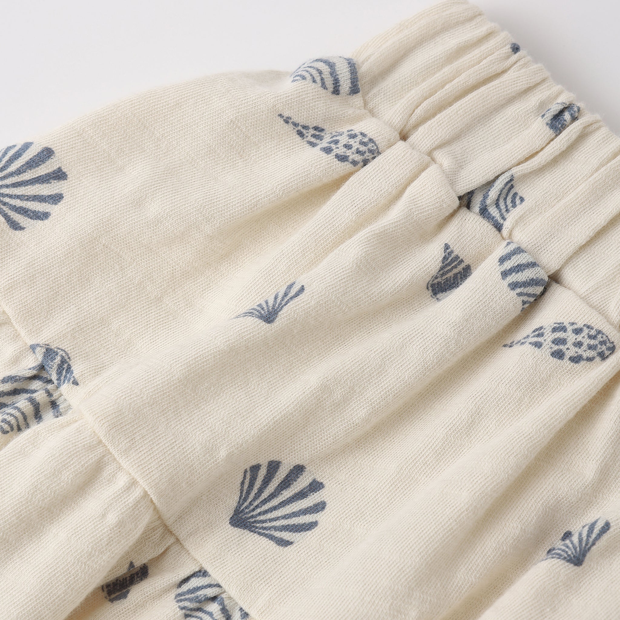 Close view of seashell pattern on the Tiered Midi Skirt Seashells | Rylee +Cru