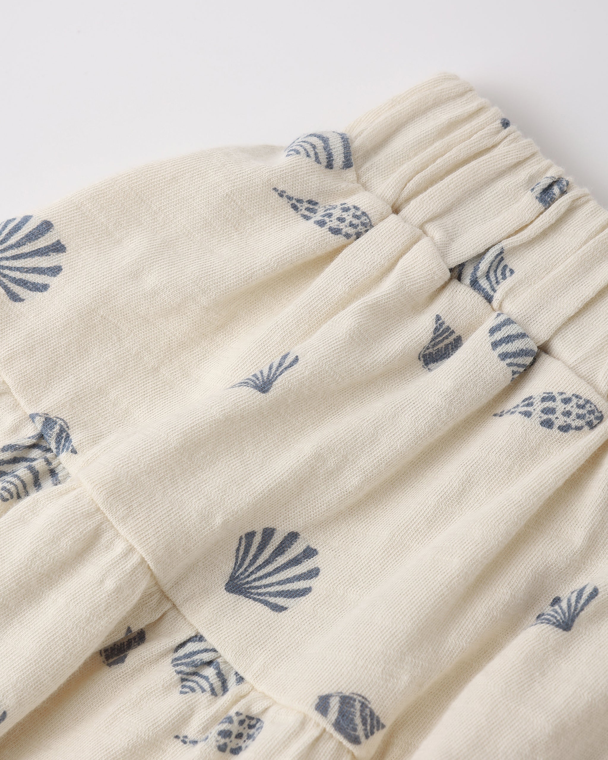 Close view of seashell pattern on the Tiered Midi Skirt Seashells | Rylee +Cru