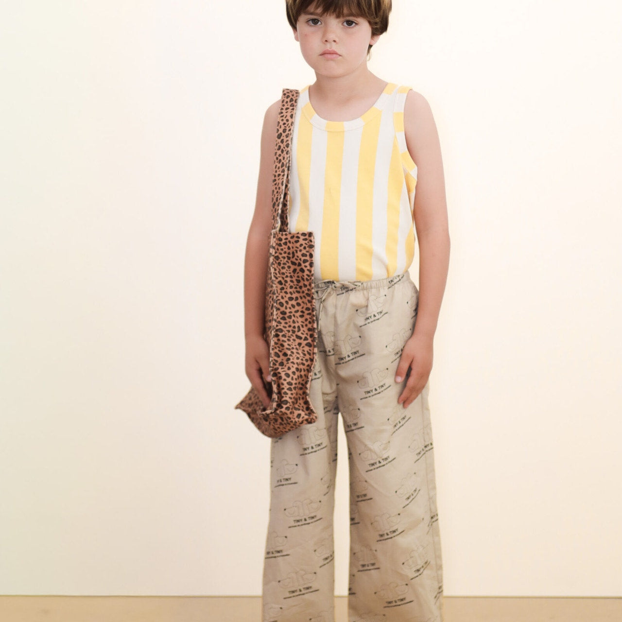 Boy wearing Tiny & Tiny Twill Pant – Dark Vanilla by Tiny Cottons