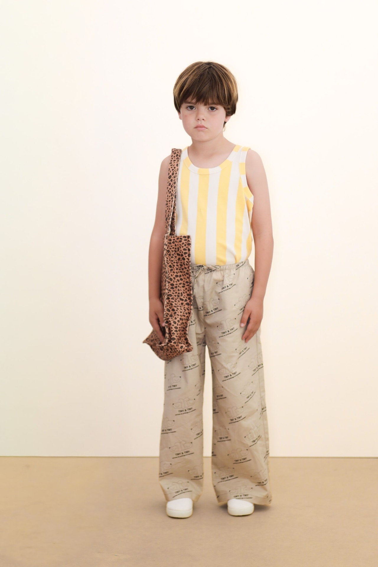 Boy wearing Tiny & Tiny Twill Pant – Dark Vanilla by Tiny Cottons