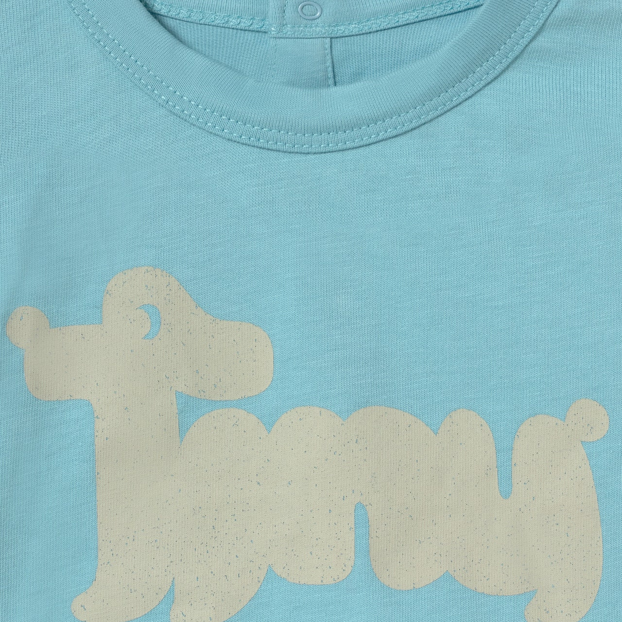 Close up of print and fabric on the Tiny Dog Graphic Baby Tee - Light Cyan | Tiny Cottons