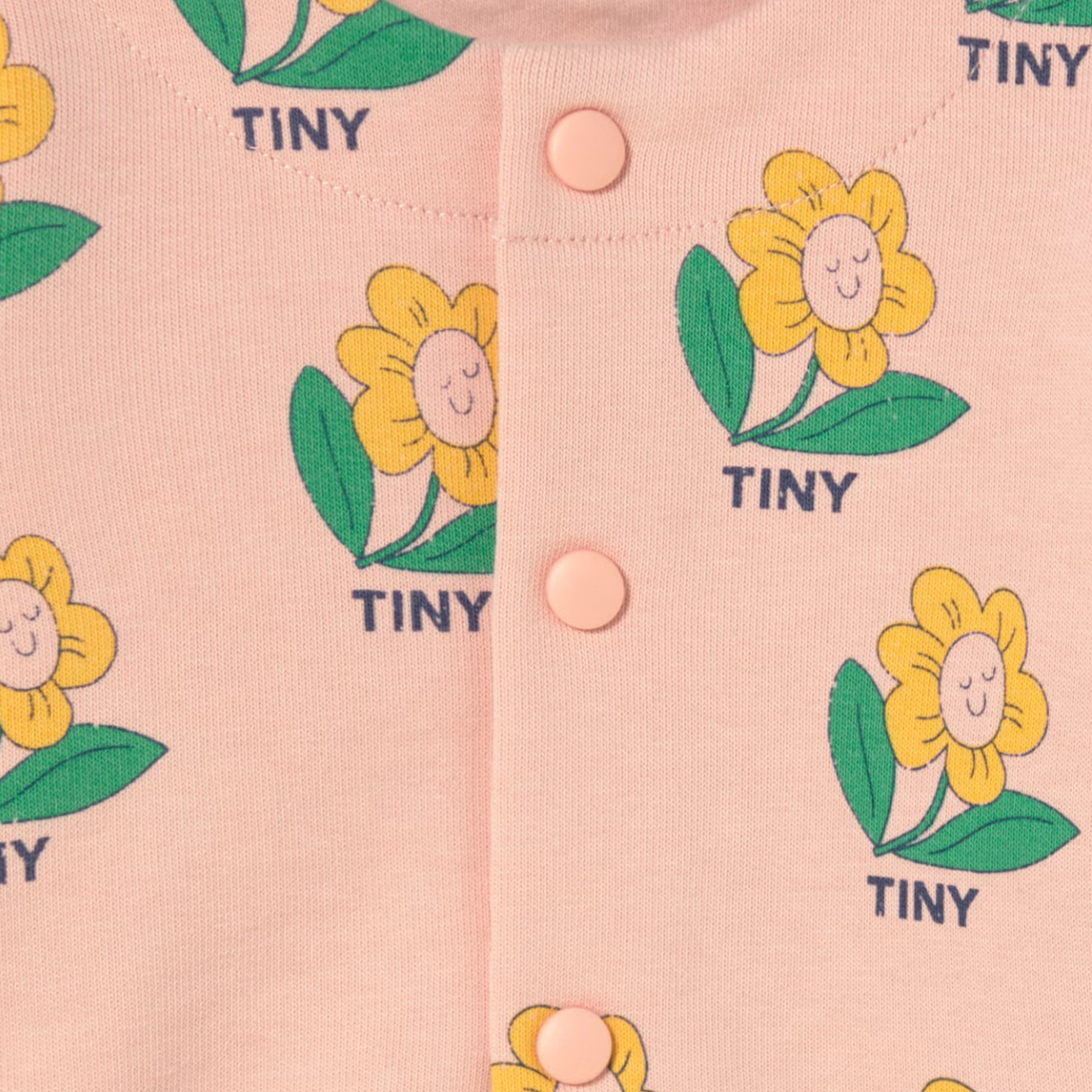 Close up of buttons and print on the Tiny Flower Baby Jacket - Wild Rose | Tiny Cottons