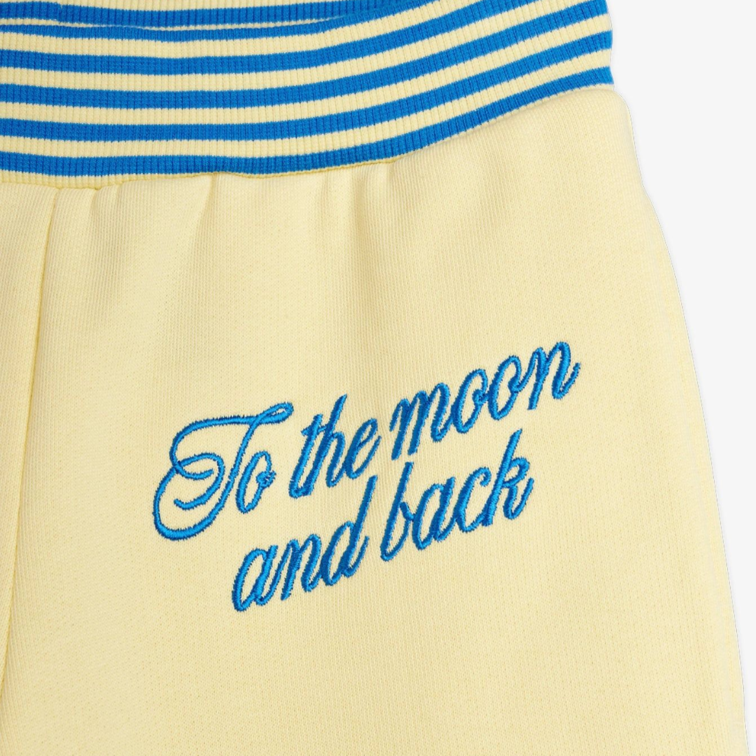 Close up of embroidery on the To the moon emb sweatpants - Yellow | Mini Rodini
