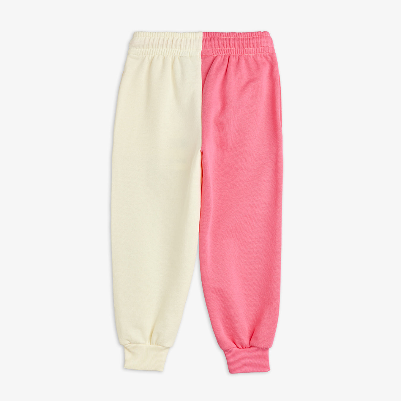 Travel agency split color sp sweatpants by Mini Rodini with pink and cream colour block design