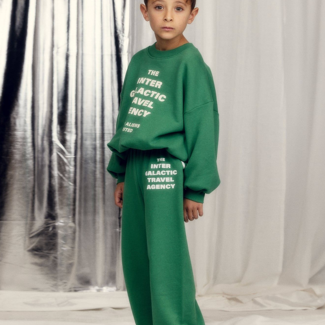 Boy wearing Travel agency sp sweatpants - Green | Mini Rodini