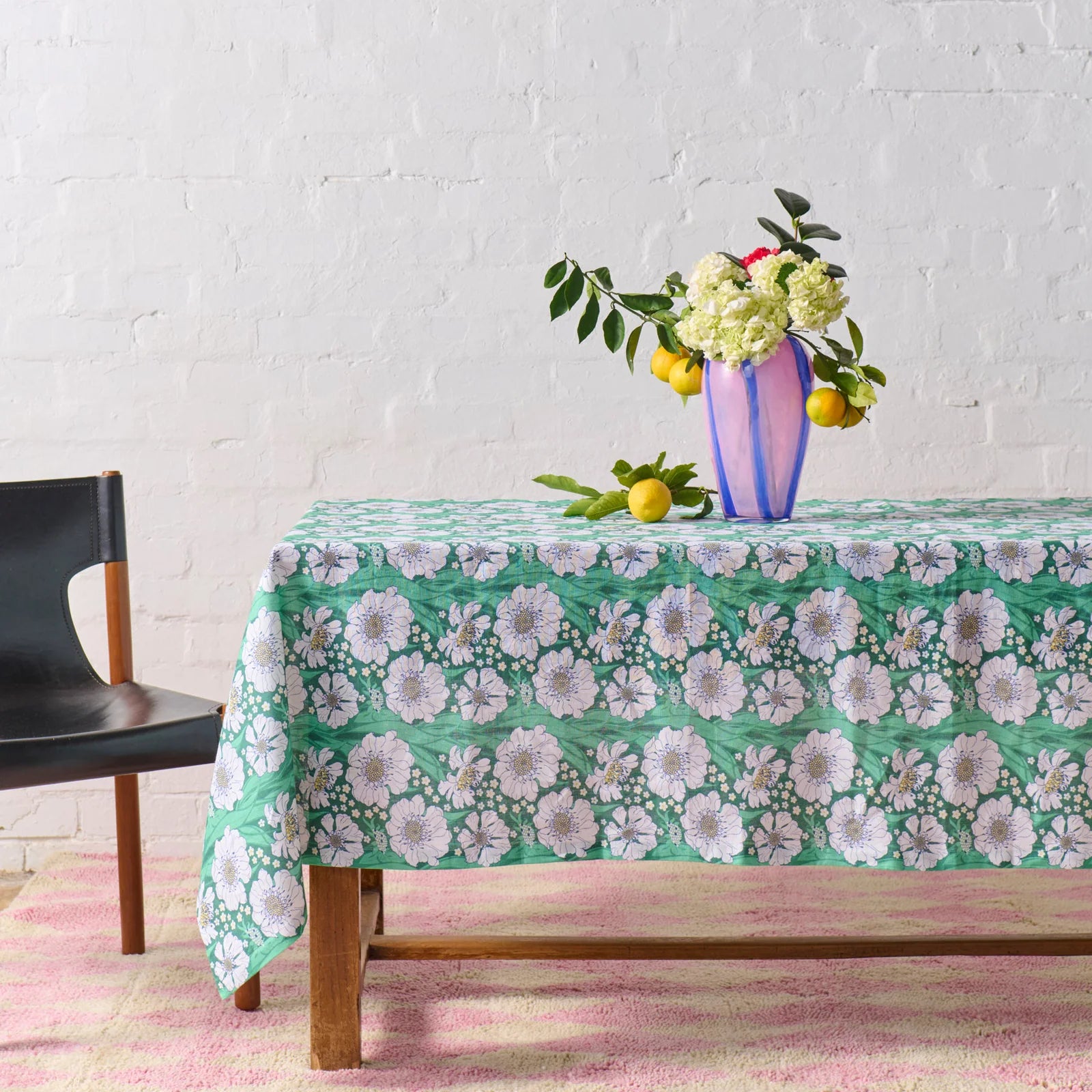 Large linen tablecloth with green and white flowers by Kip and Co