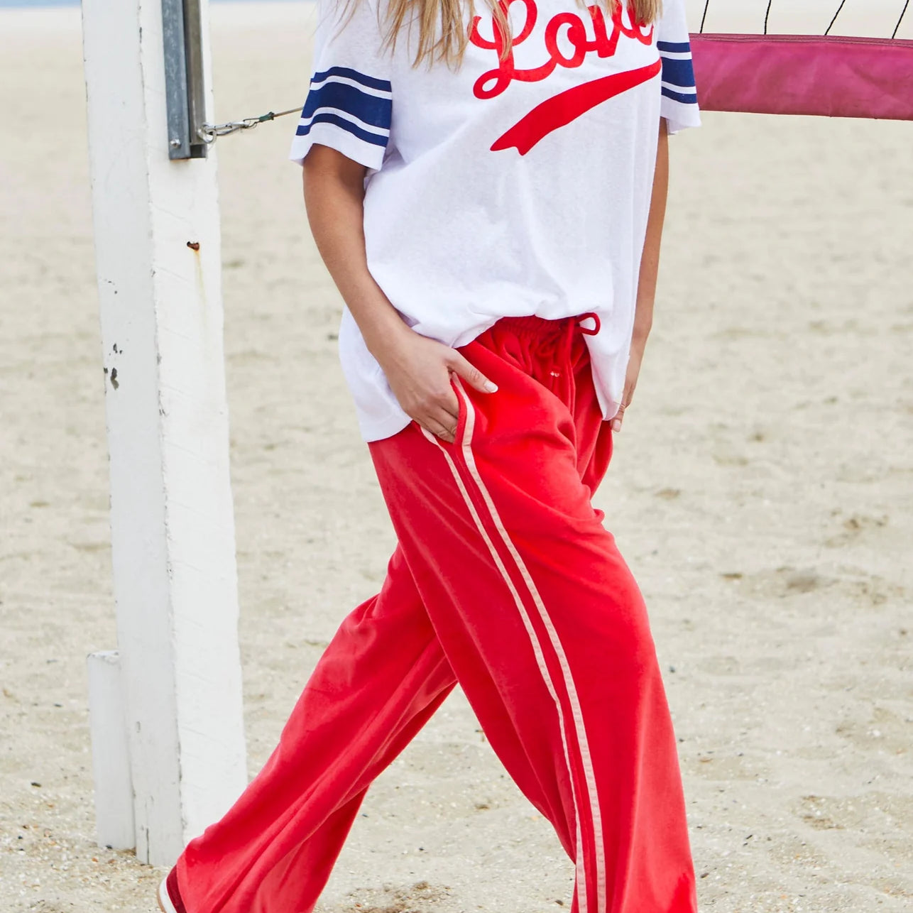 Womens Red velour track pants with pink stripes