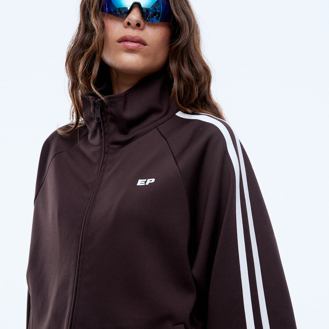 Cocoa brown zip through jacket with raglan sleeves and contrast stripe detailing lifestyle shot