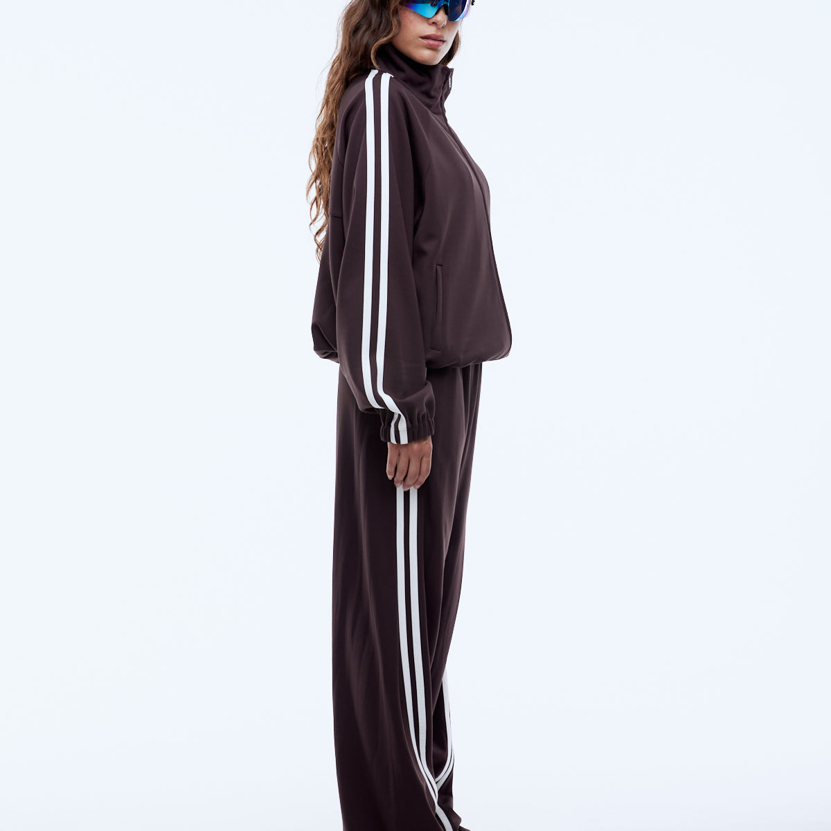 lady wearing Ena Pelly Valentina Zip Thru cocoa jacket worn casually with adjustable drawcord hem styling