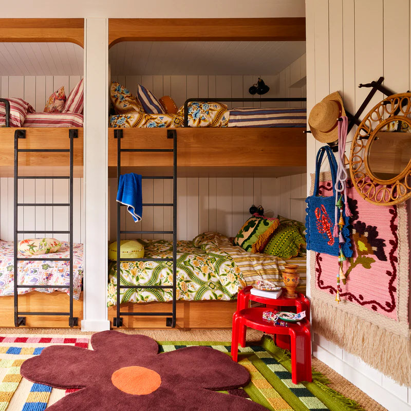 bedroom with Venessia Tufted Cushion by Sage & Clare