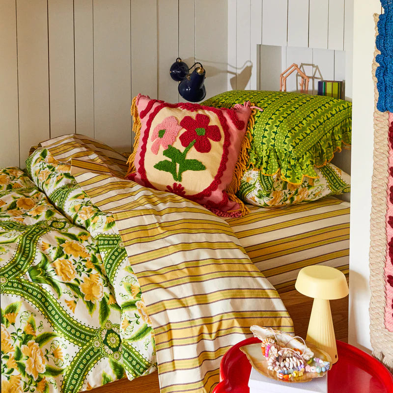 pink and red floral embroidered cushion by Sage & Clare