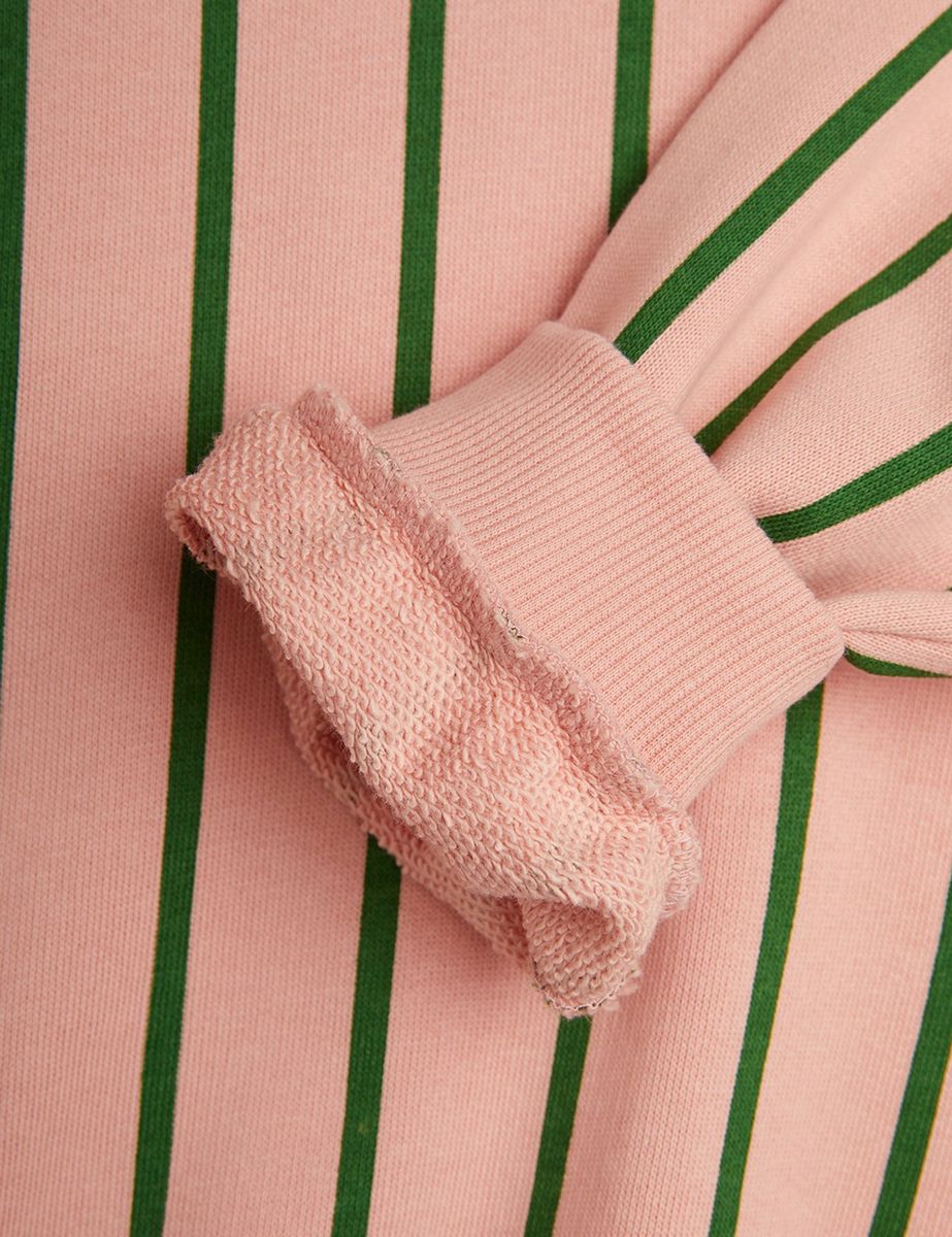 Close-up of a pink garment with green stripes - Mini Rodini Childrens Jumpers