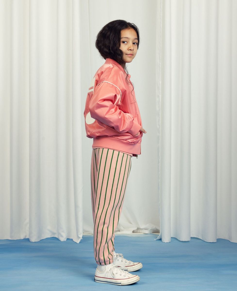 girl wearing Vertical stripe sweatpants pink & green by Mini Rodini