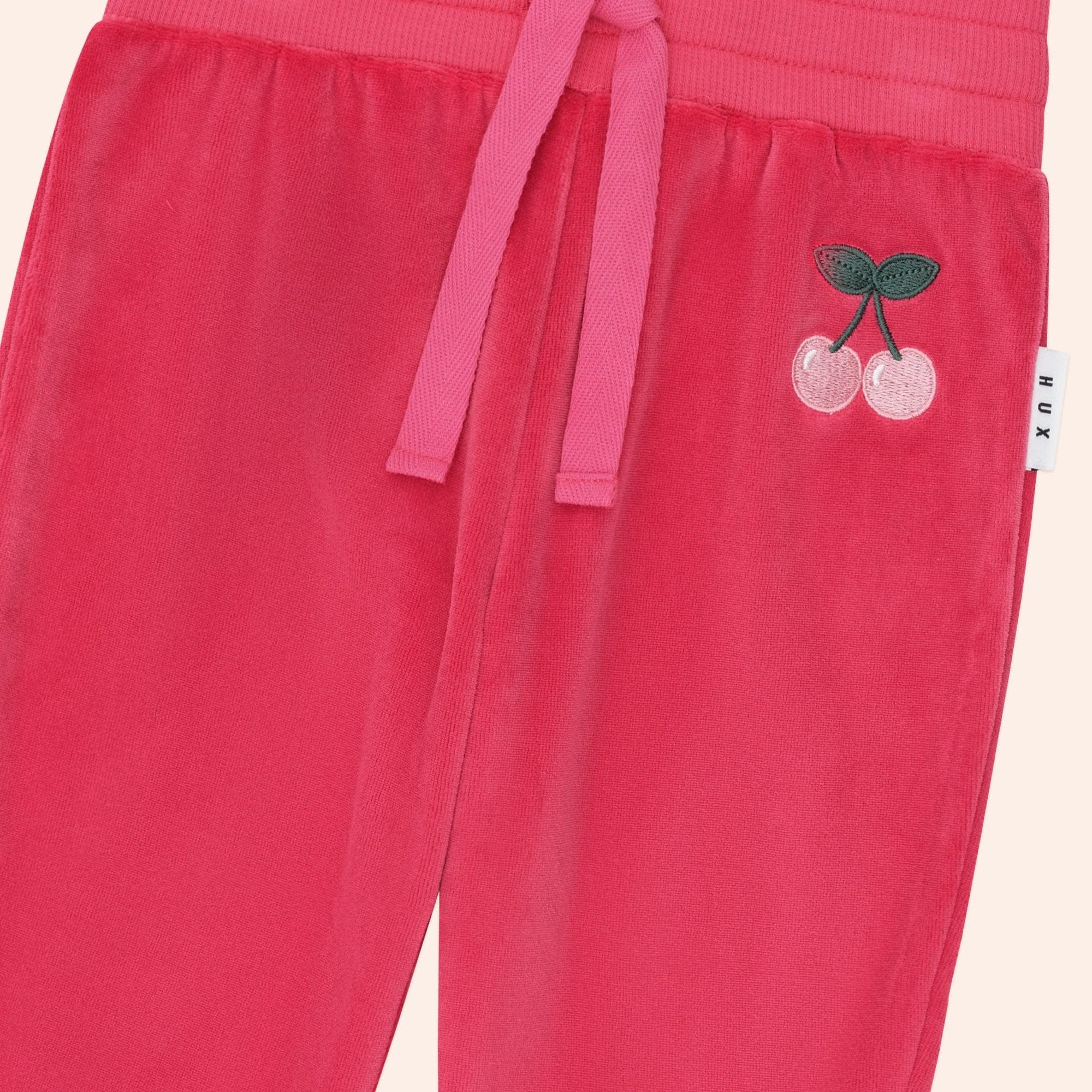 Close up of details on the Very Cherry Velour Trackpant | Huxbaby