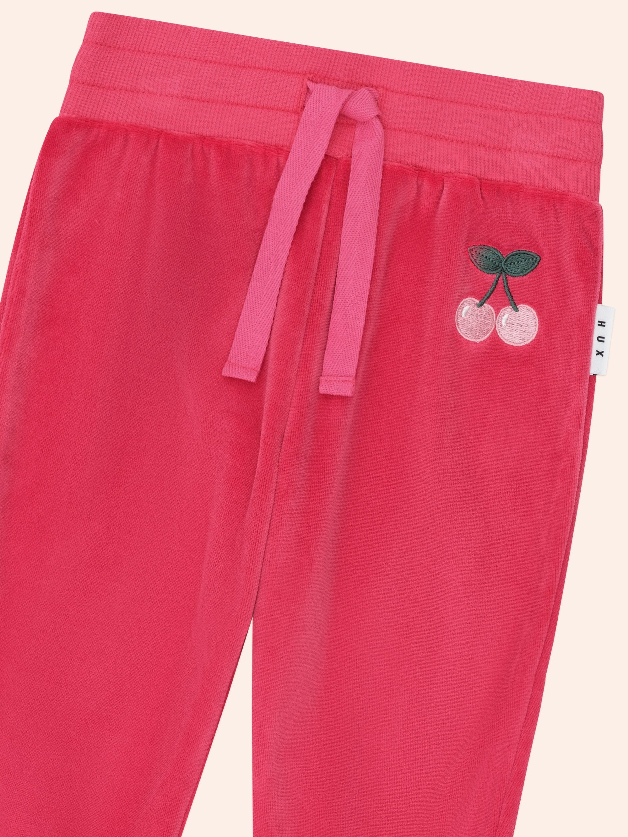Close up of details on the Very Cherry Velour Trackpant | Huxbaby