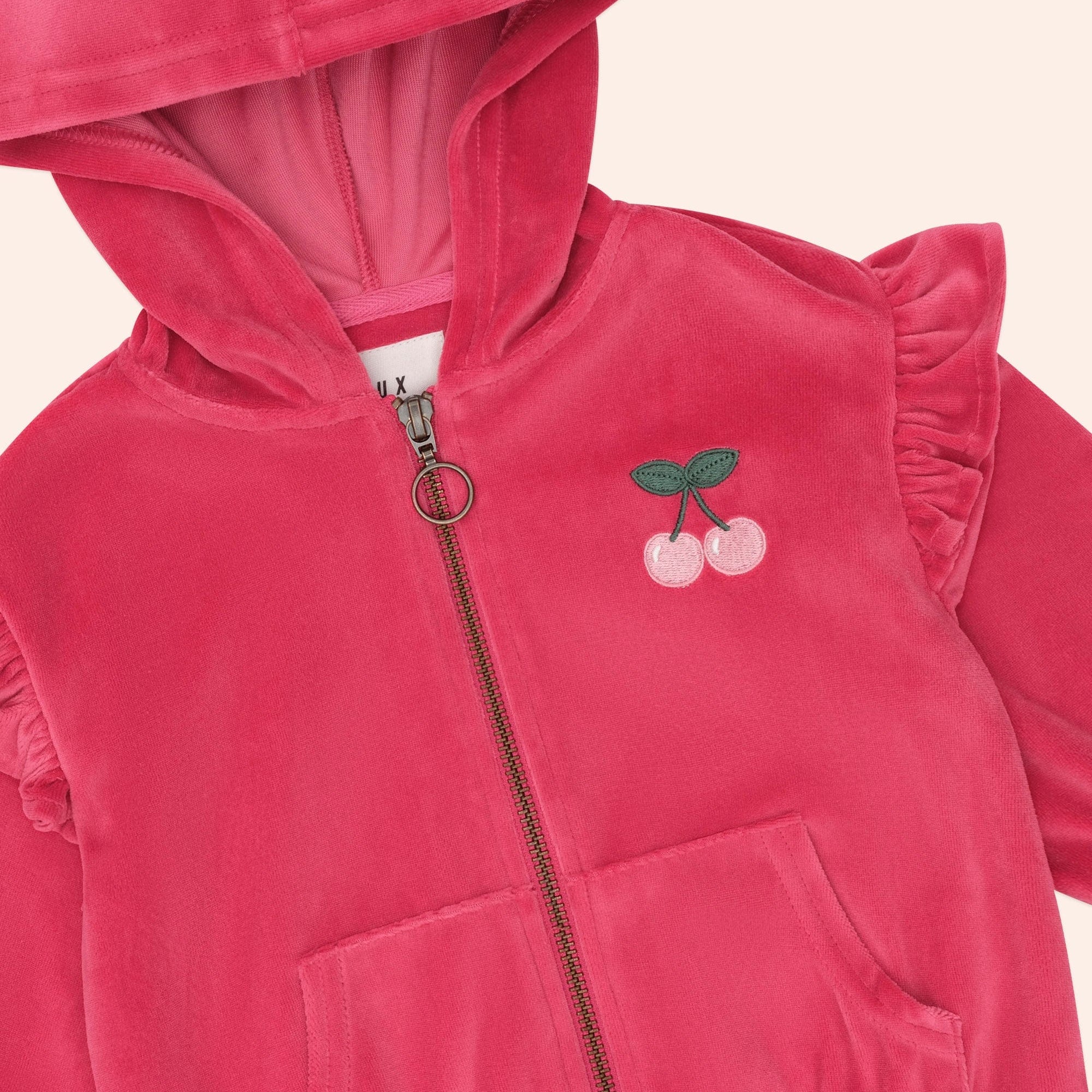 Close up depicting the Very Cherry Velour Zip Up Hoodie | Huxbaby
