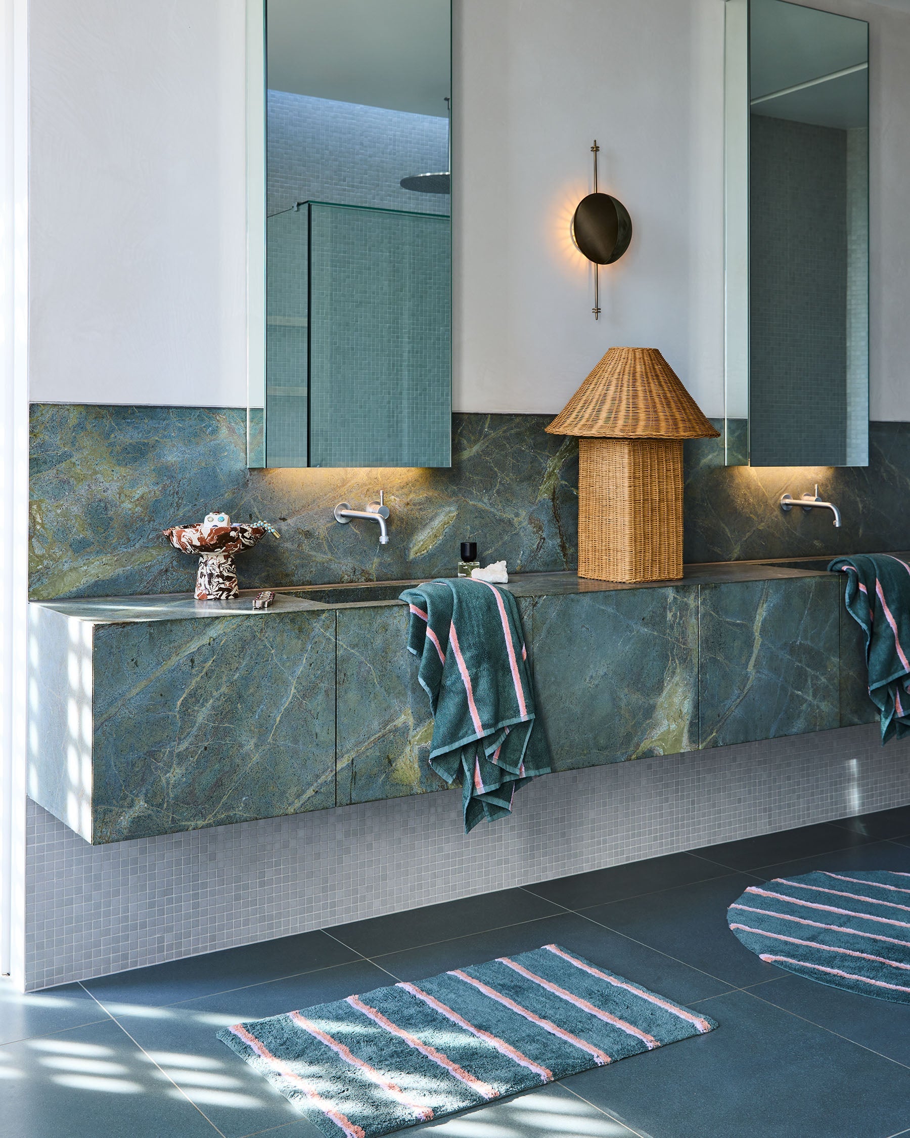 Kip & Co Wakame Crush Stripe Bath Mat placed on modern bathroom floor with marble vanity backdrop