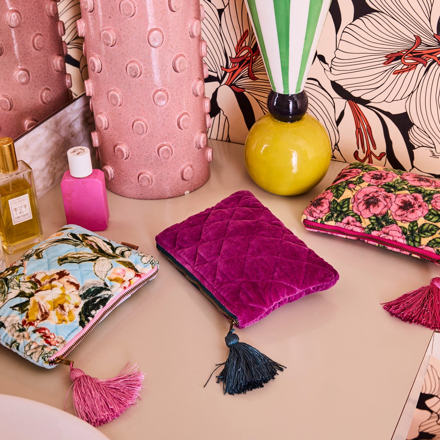 Close-up view of Wild Grape Velvet Cosmetics Purse showing quilted texture and decorative tassel detail