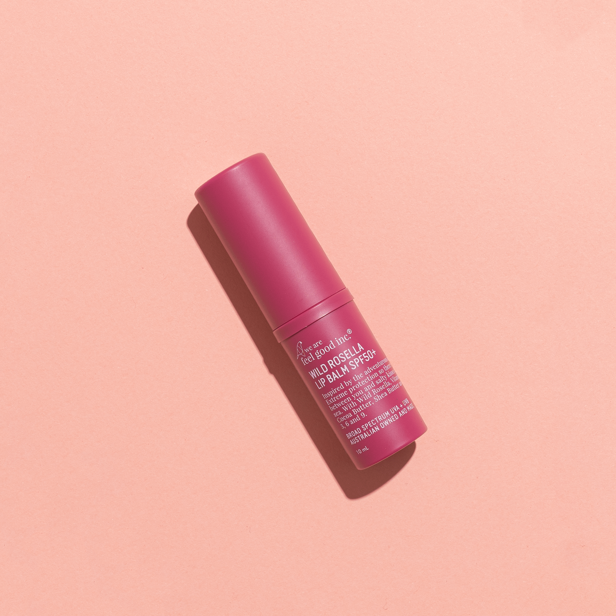 We are Feel Good Wild Rosella Lip Balm SPF50 being applied to lips for sun protection