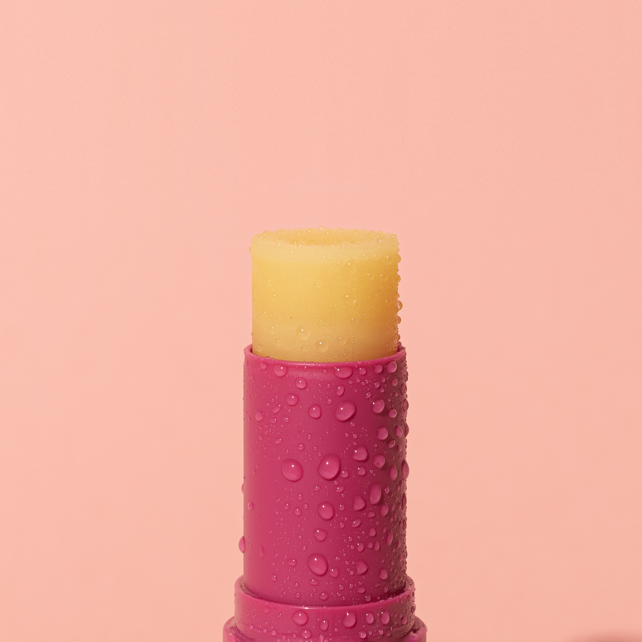 Close up detail of Wild Rosella Lip Balm SPF50 smooth lightweight formula texture