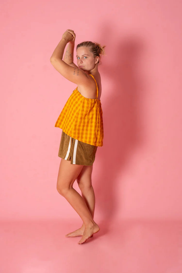 model wearing Patchwork Singlet by Atmosea – Ginger Gingham