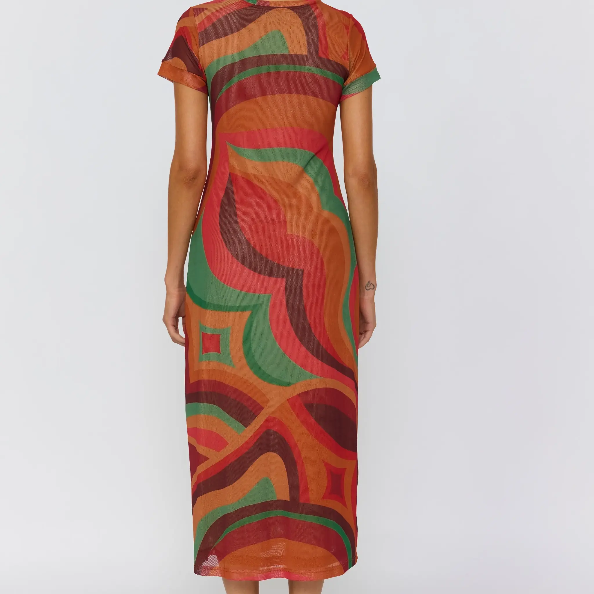 Back view of Yoko Midi Dress revealing continuous swirl pattern and short sleeve construction