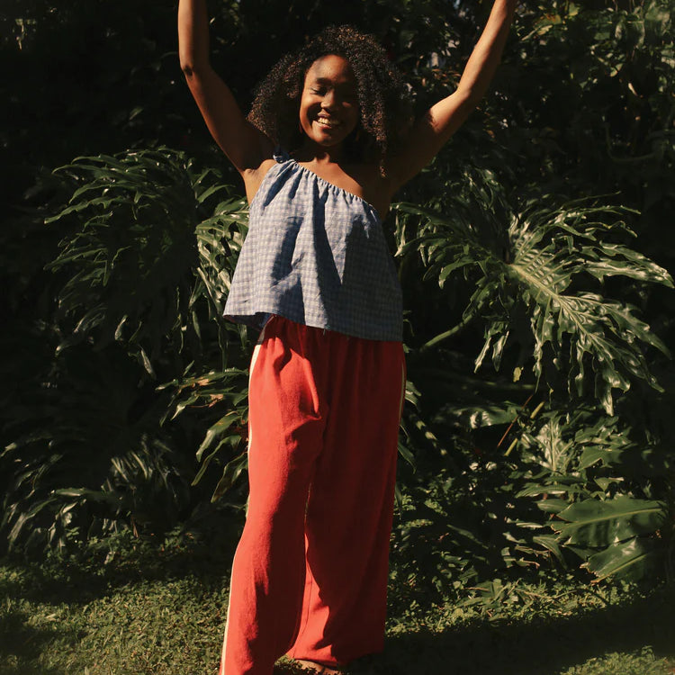 model wearing Apres Surf Pant by Atmosea – Chilli