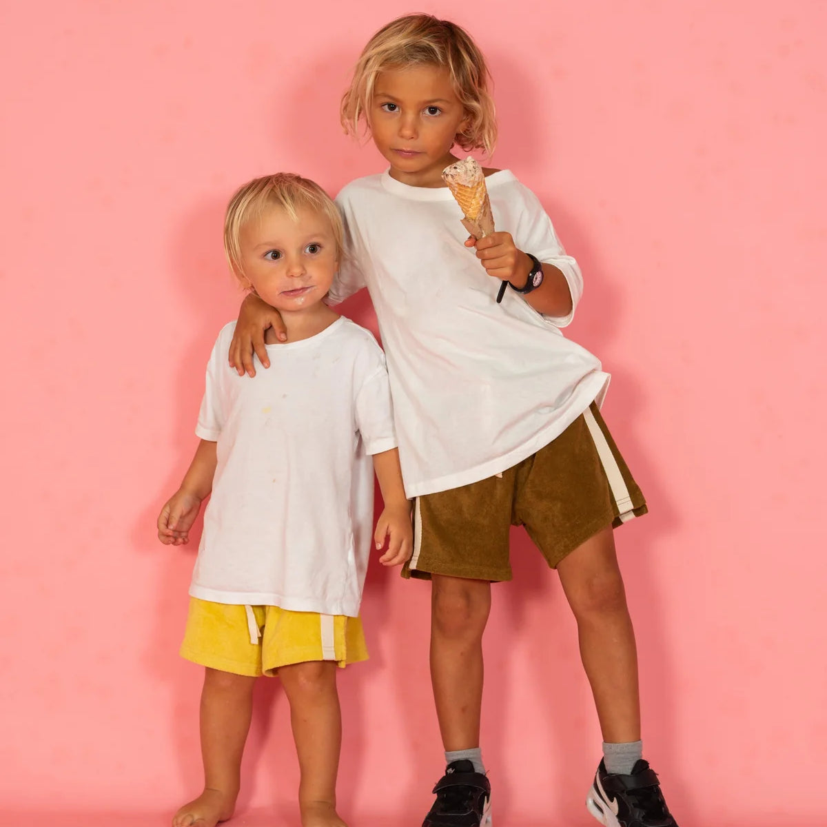 Kids terry shorts with white stripes down the sides