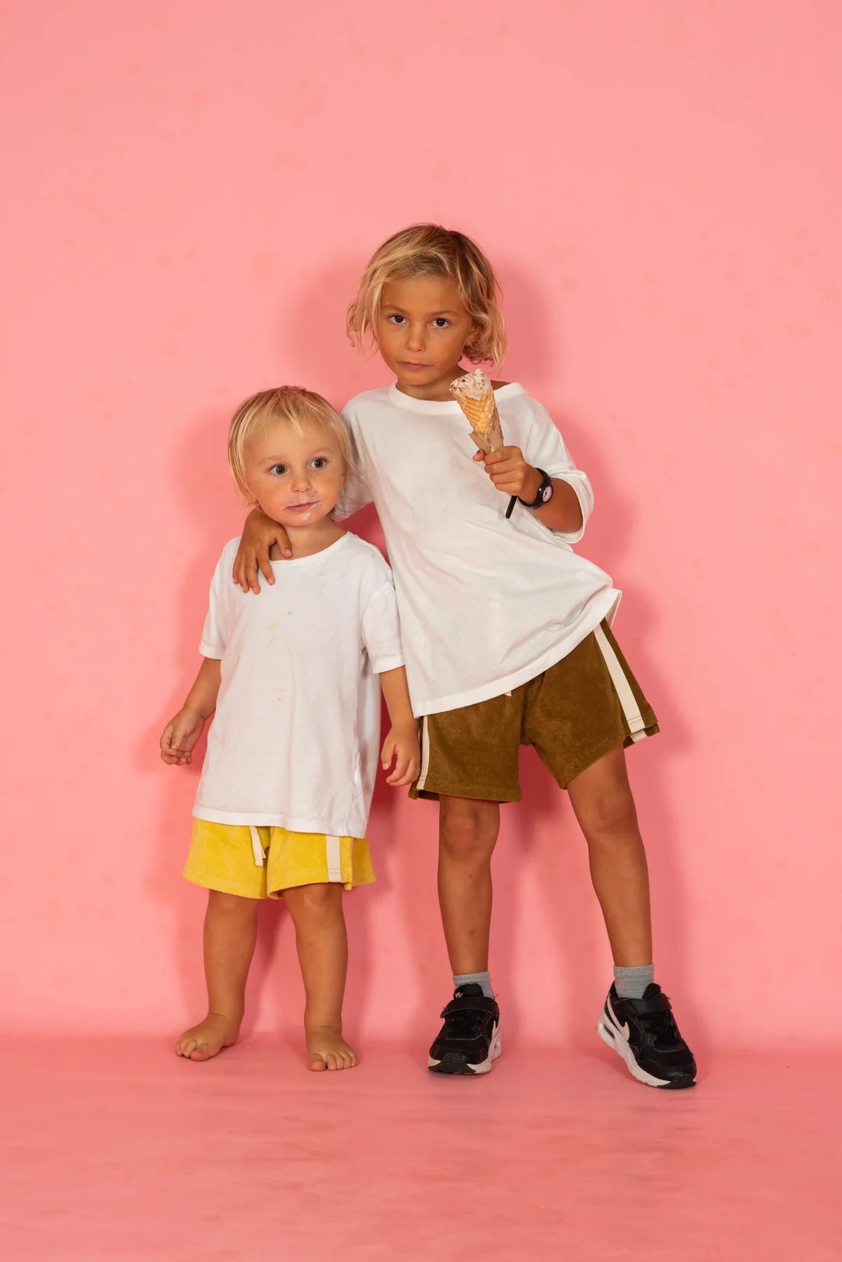 Kids terry shorts with white stripes down the sides