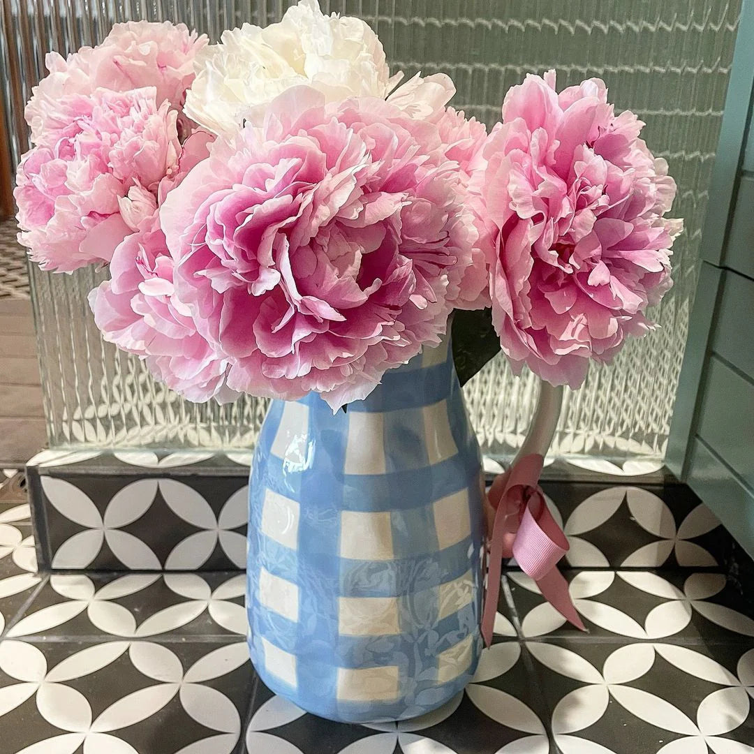 Large blue gingham jug from Noss and co being used as a vase