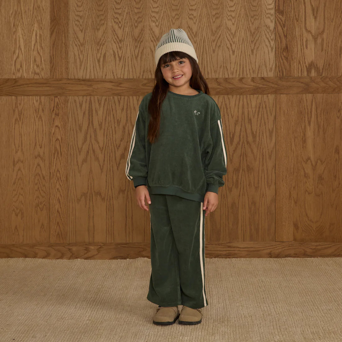 Girl wearing kids Oversized terry sweatshirt green with white stripes by Rylee + Cru