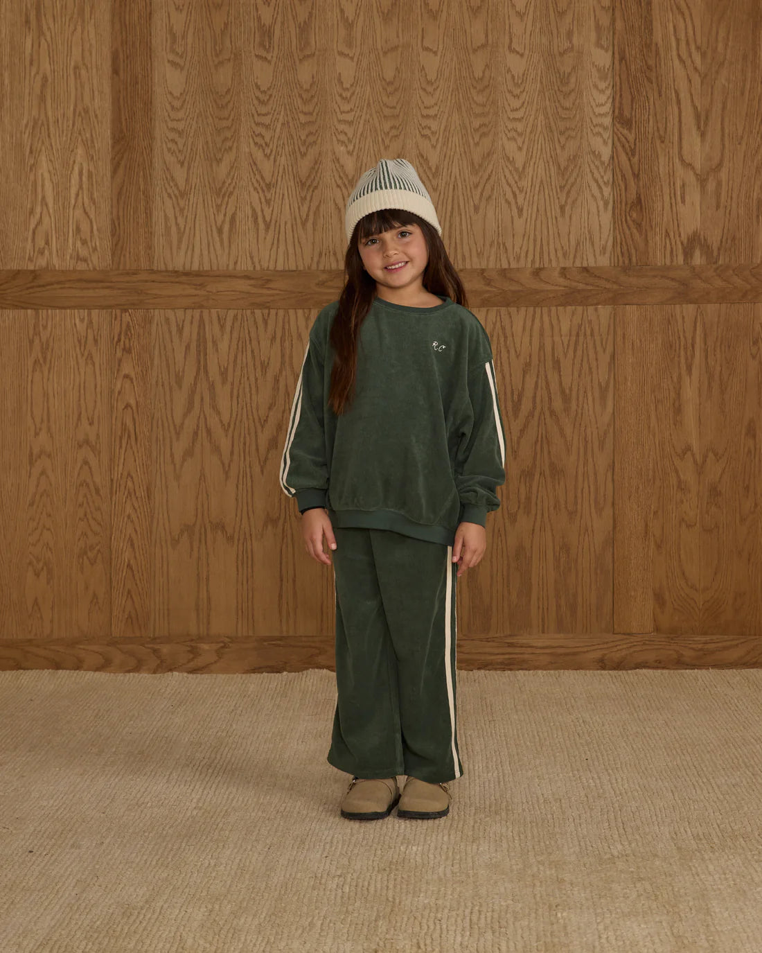 Girl wearing kids Oversized terry sweatshirt green with white stripes by Rylee + Cru