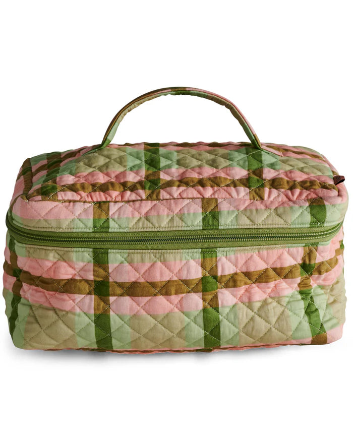 Quilted cosmetic bag with green and pink plaid pattern on a white background