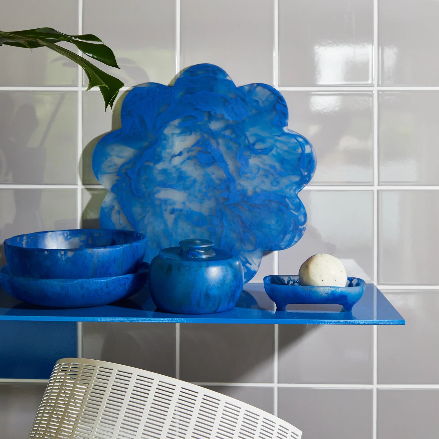 resin halleck canister lapis blue by Sage & Clare canister on shelf with serving platter