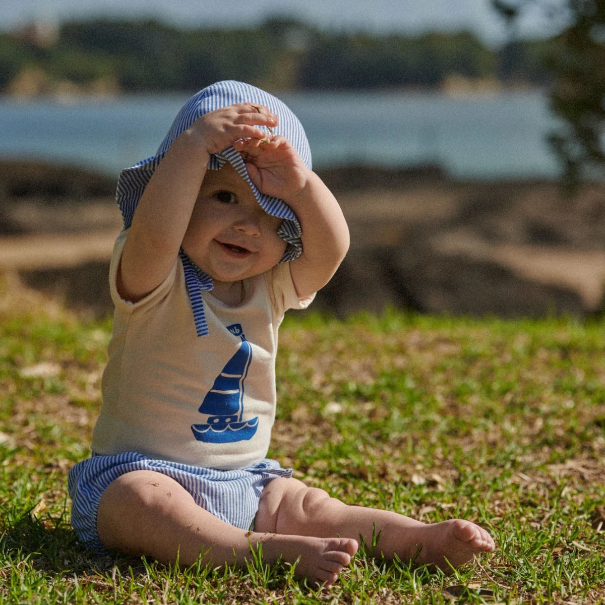 baby wearing Stretch Jersey Short Sleeve Bodysuit Sail Boat by Nature Baby