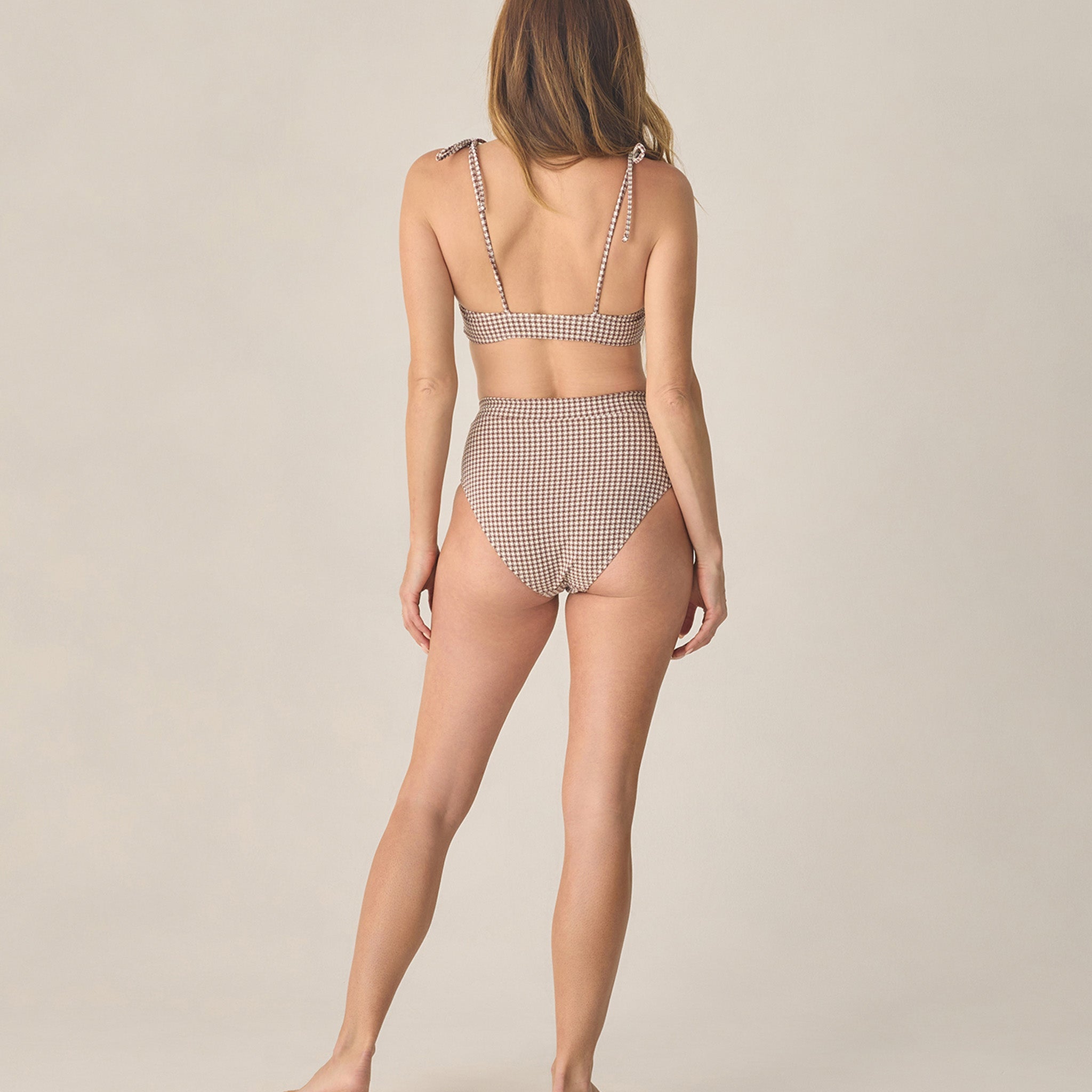 back view of lady wearing Women's Alba Bikini Top Chocolate Houndstooth by Rylee Cru