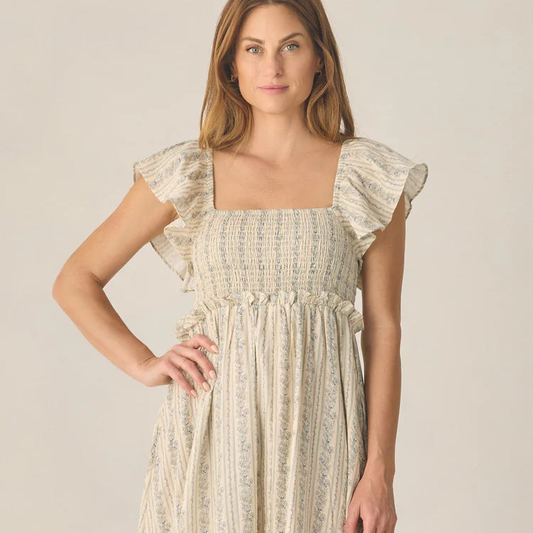 lady wearing Women's Francesca Dress Blue Floral by Rylee & Cru