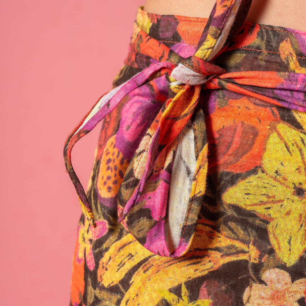 Wrap skirt in fruity by Atmosea side tie detail