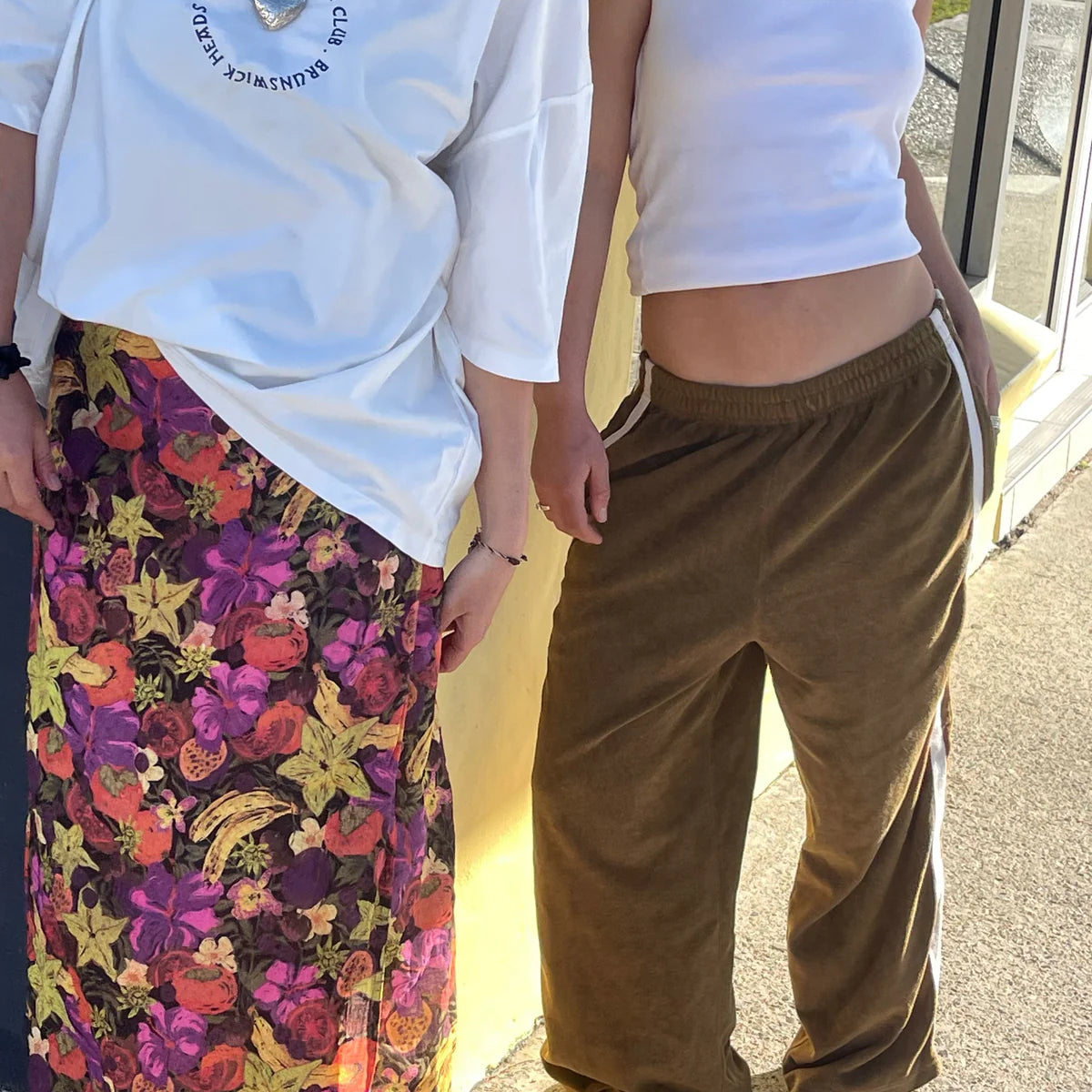 woman wearing Wrap skirt in fruity by Atmosea