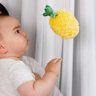 baby playing with 2 Pack Mini Market Brunch Stroller Toys - Pineapple & Cherries by Living Textiles