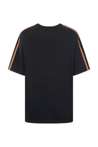 Back view of black AOH Raglan Tee displaying raglan sleeve construction and orange stripe detailing