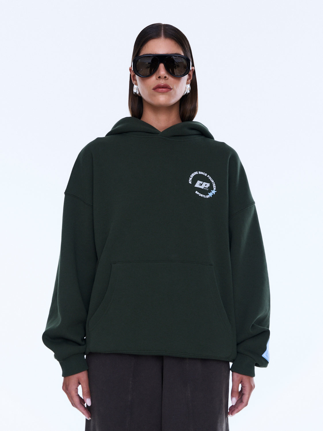 Front view of moss green Aries Hoodie with kangaroo pocket and relaxed fit