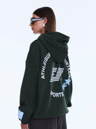 Three-quarter back view of Aries Hoodie displaying text and star graphic