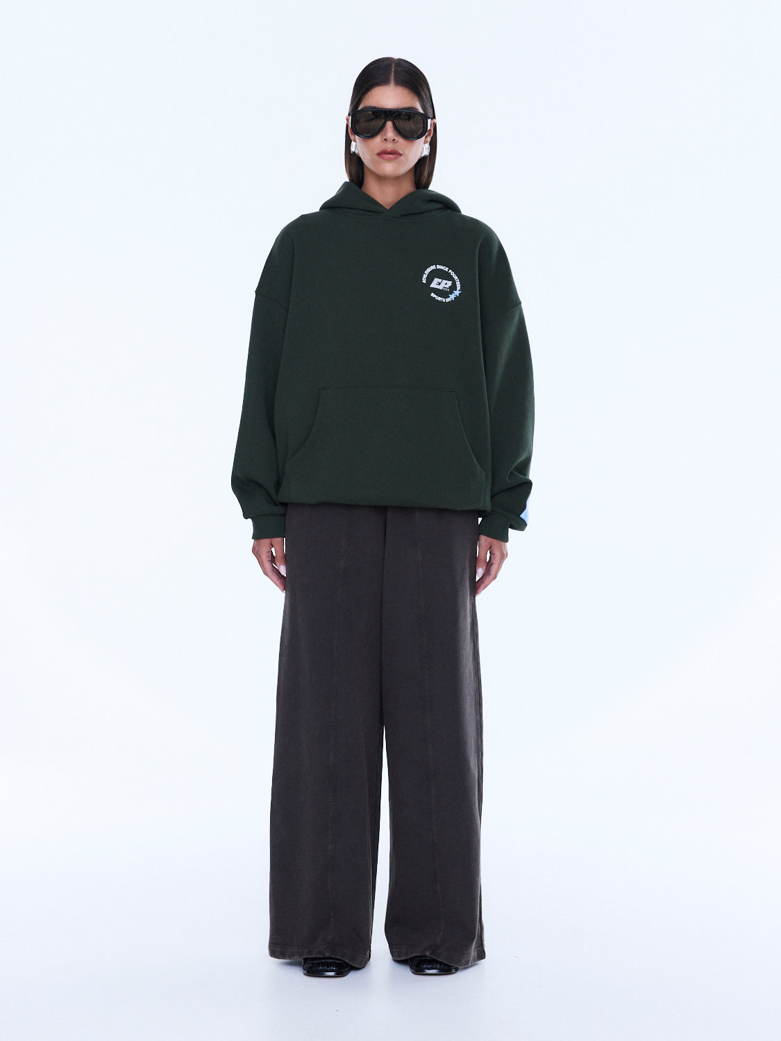 Full body front view of moss green Aries Hoodie with chest logo