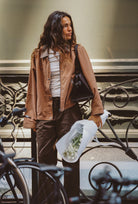 lady wearing Juni Addison cotton canvas jacket camel relaxed fit womens outerwear