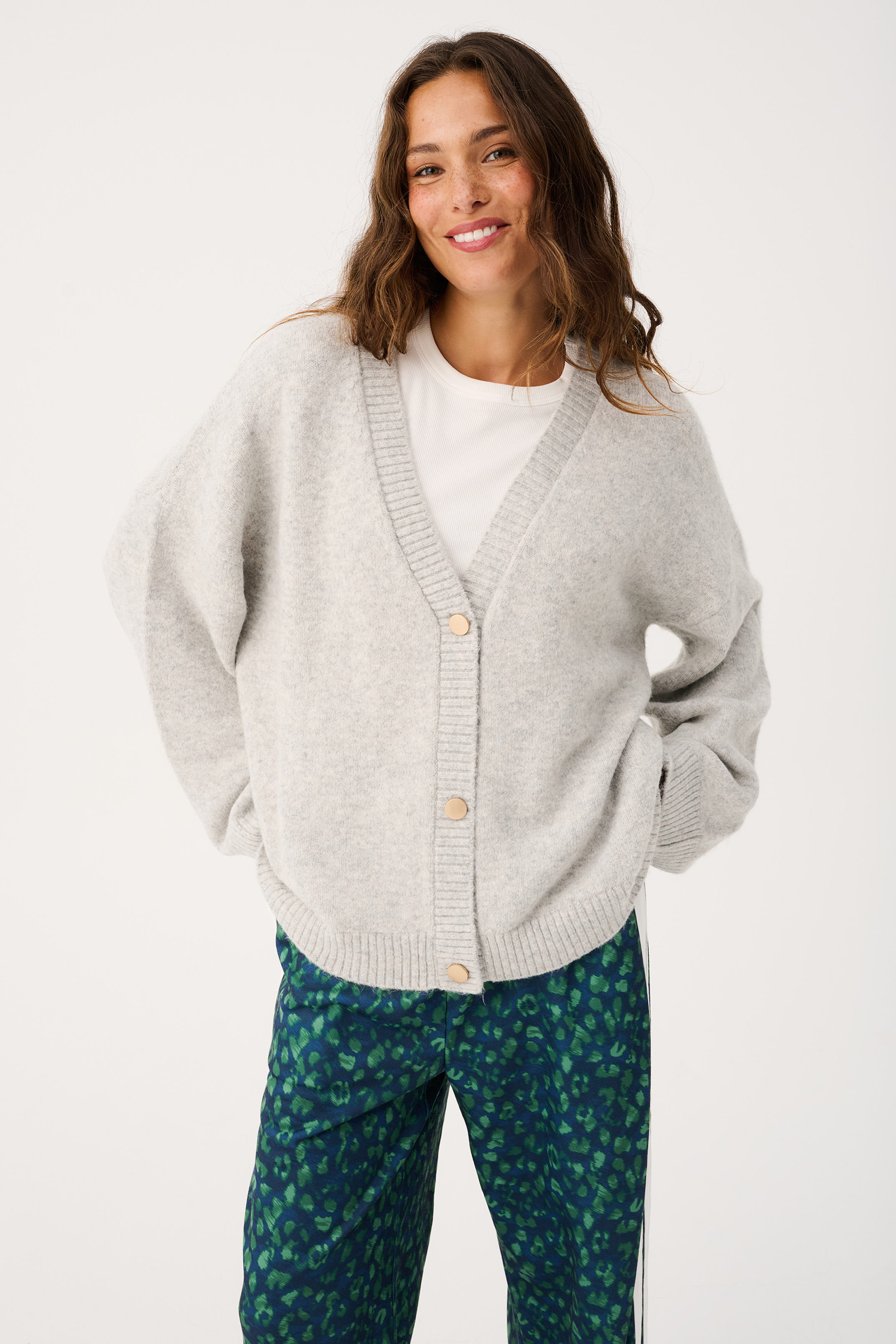 Front view of Adela grey marle knit cardigan with V-neck and button closure styling