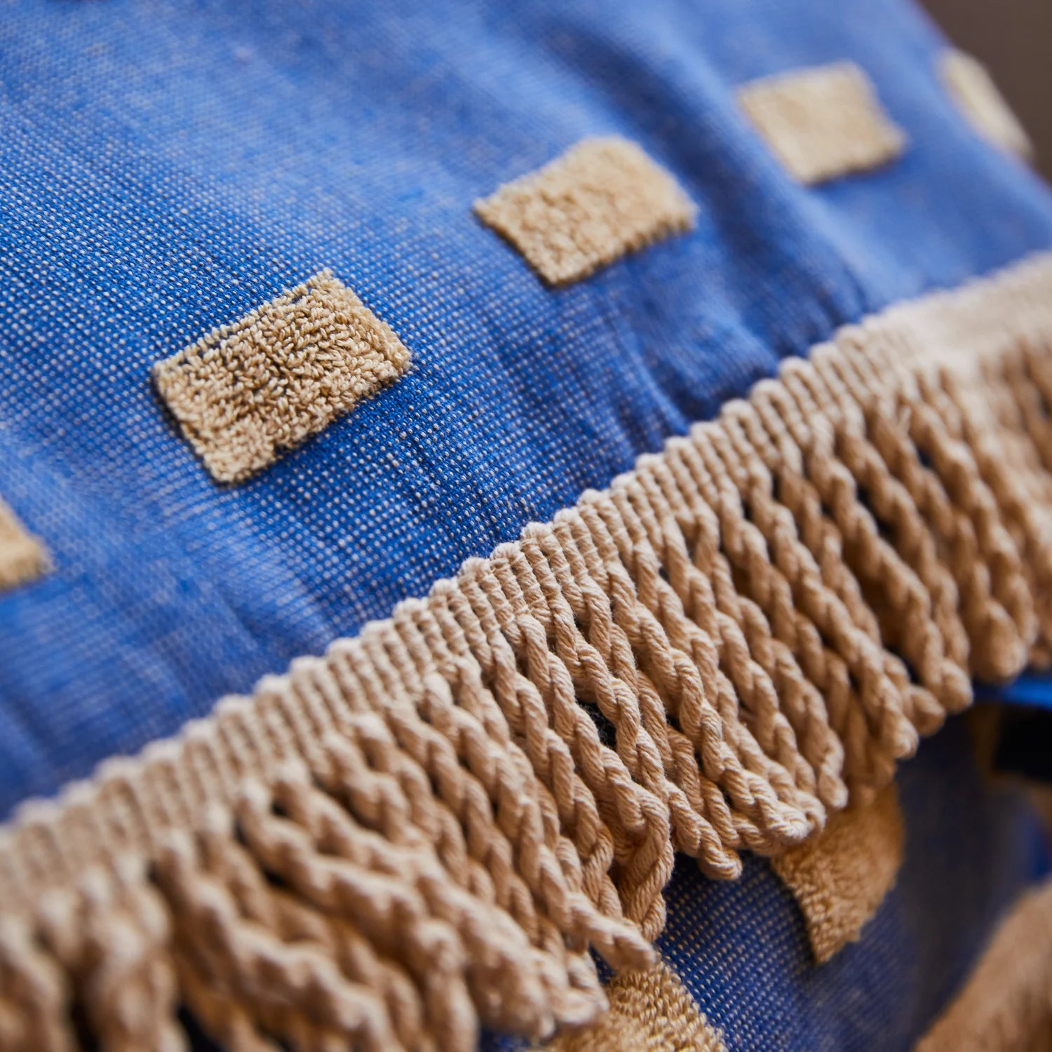 Blue fringed hand towel from Sage and Clare's Luna Collection